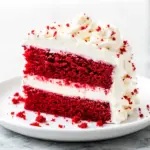 red velvet cake with whipped cream cheese frosting - featured image